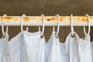 How to Clean a Shower Curtain without Taking It Down